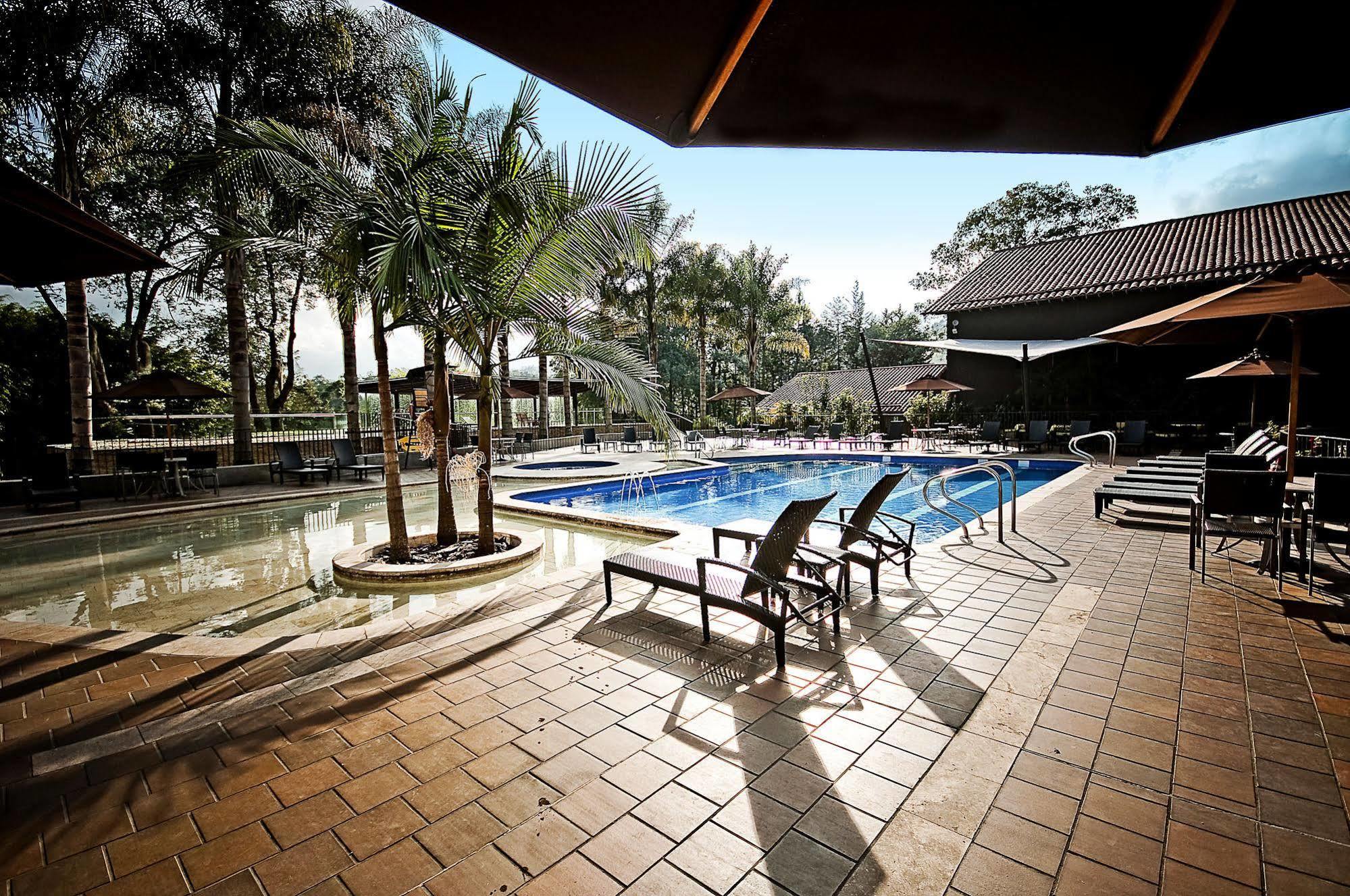 Movich Hotel Las Lomas Rionegro Esterno foto The swimming pool at the resort