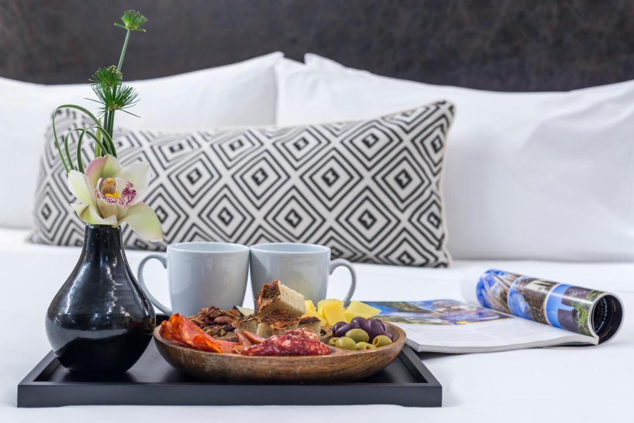 Movich Hotel Las Lomas Rionegro Esterno foto A breakfast tray
